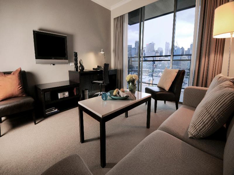 The Star Grand Hotel And Residences Sydney Exteriér fotografie A living room in a serviced apartment in Singapore